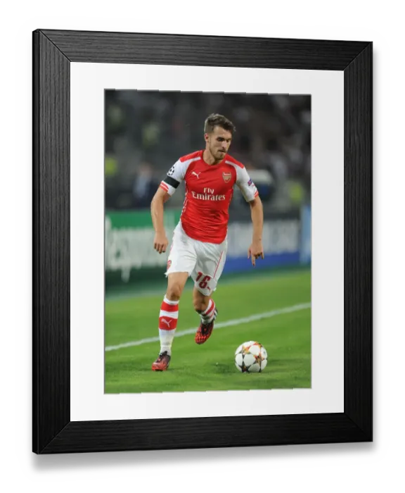 Framed Print : Aaron Ramsey in Action: Arsenal vs. Besiktas, UEFA Champions League Qualifiers 2014 Framed Print : Aaron Ramsey in Action: Arsenal vs. Besiktas, UEFA Champions League Qualifiers 2014