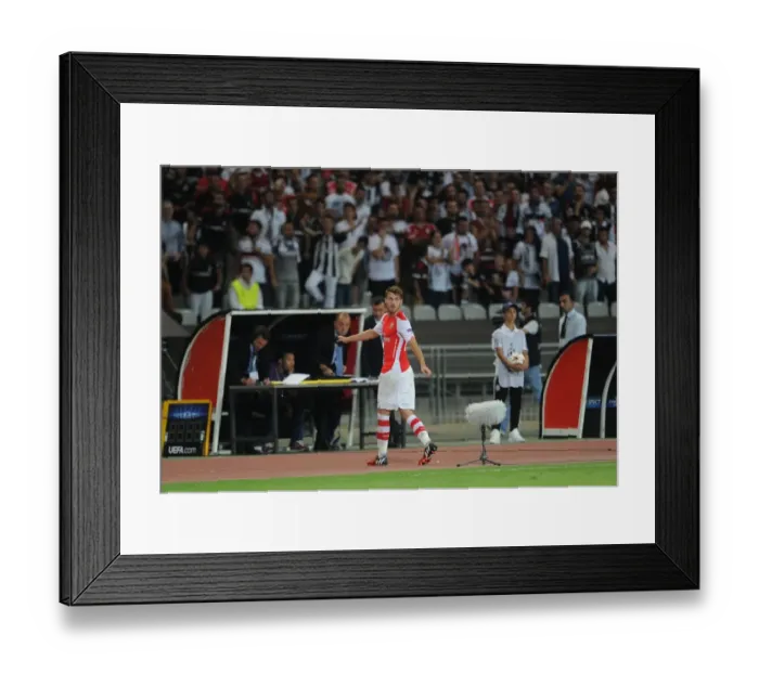 Framed Print : Aaron Ramsey's Red Card: Arsenal's Struggle in Besiktas v Arsenal, UEFA Champions League Qualifying Play-Offs (2014)