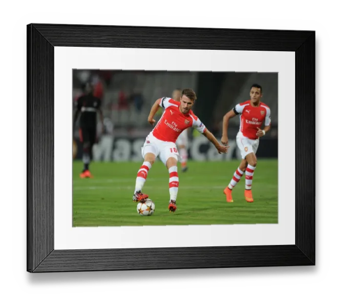 Framed Print : Aaron Ramsey (Arsenal). Besiktas 0: 0 Arsenal. UEFA Champions League Qualifier 1st Leg