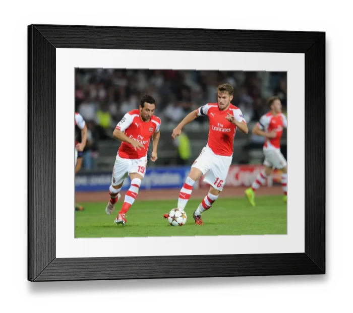 Framed Print : Aaron Ramsey and Santi Cazorla (Arsenal). Besiktas 0: 0 Arsenal. UEFA Champions League Framed Print : Aaron Ramsey and Santi Cazorla (Arsenal). Besiktas 0: 0 Arsenal. UEFA Champions League