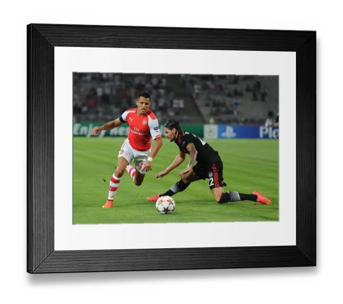 Framed Print : Clash of Stars: Sanchez vs. Gulum in Arsenal's UEFA Champions League Battle against Besiktas Framed Print : Clash of Stars: Sanchez vs. Gulum in Arsenal's UEFA Champions League Battle against Besiktas