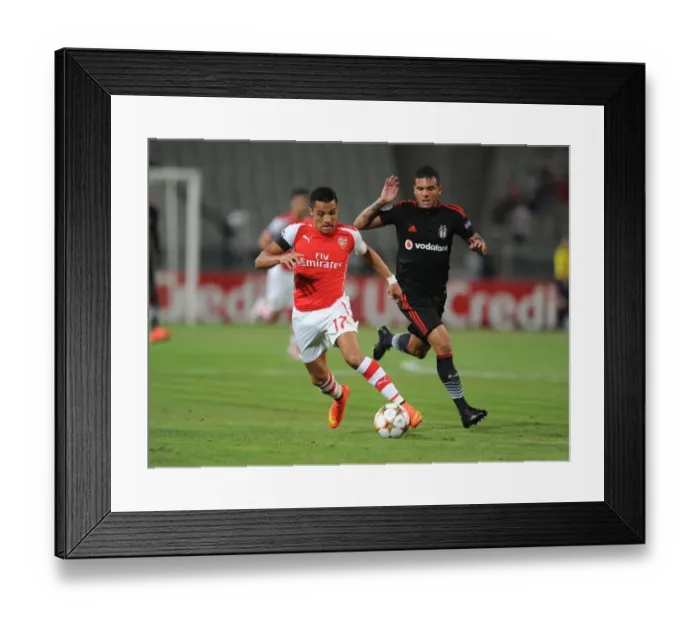 Framed Print : Clash of Stars: Alexis Sanchez vs. Ramon Motta - Besiktas vs. Arsenal, UEFA Champions League Qualifiers (2014) Framed Print : Clash of Stars: Alexis Sanchez vs. Ramon Motta - Besiktas vs. Arsenal, UEFA Champions League Qualifiers (2014)