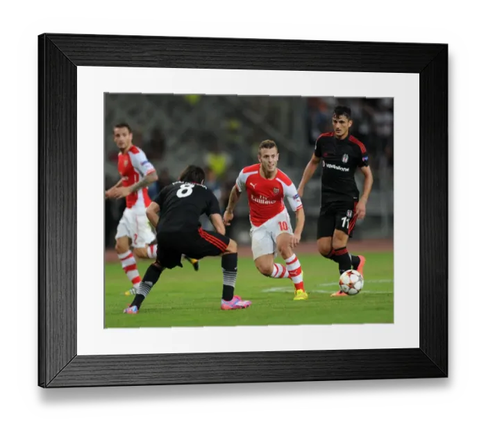 Framed Print : Jack Wilshere Clashes with Mustafa Pektemek and Veli Kaviak in Arsenal's UEFA Champions League Battle against Besiktas Framed Print : Jack Wilshere Clashes with Mustafa Pektemek and Veli Kaviak in Arsenal's UEFA Champions League Battle against Besiktas