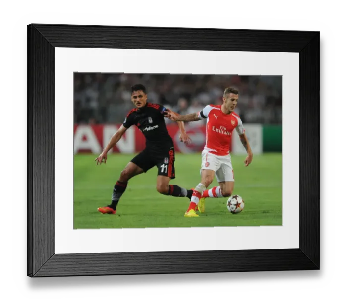 Framed Print : Jack Wilshere vs Mustafa Pektemek: Battle in Istanbul - Arsenal vs Besiktas, UEFA Champions League Qualifiers 2014 Framed Print : Jack Wilshere vs Mustafa Pektemek: Battle in Istanbul - Arsenal vs Besiktas, UEFA Champions League Qualifiers 2014