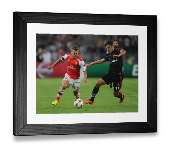 Framed Print : Battle in Istanbul: Wilshere vs Pektemek - Arsenal vs Besiktas, UEFA Champions League Qualifiers 2014
