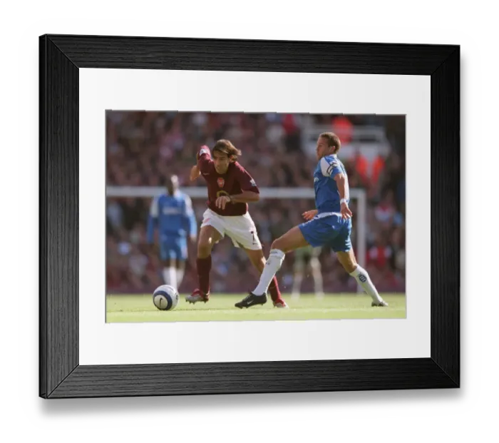 Framed Print : Robert Pires (Arsenal) Matthew Upson (Birmingham). Arsenal 1: 0 Birmingham City