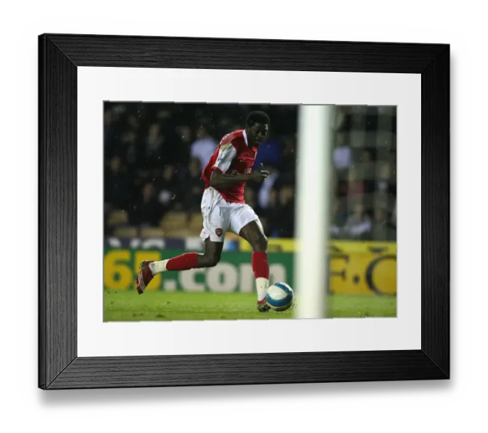Framed Print : Emmanuel Adebayor scores his 3rd and Arsenals 6th goal of the match