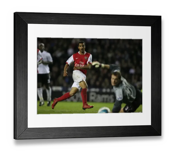 Framed Print : Theo Walcott (Arsenal) Roy Carroll (Derby) Framed Print : Theo Walcott (Arsenal) Roy Carroll (Derby)