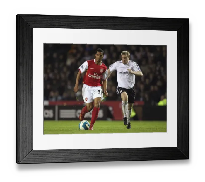 Framed Print : Theo Walcott (Arsenal) Andy Todd (Derby) Framed Print : Theo Walcott (Arsenal) Andy Todd (Derby)
