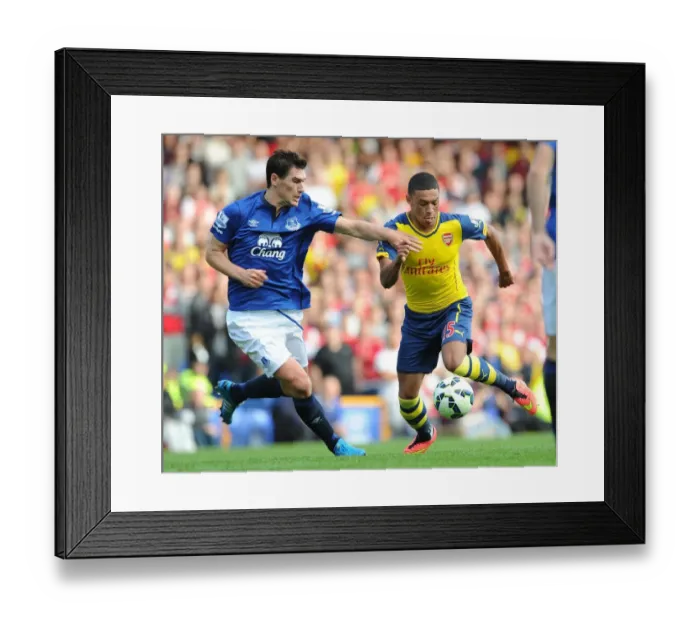 Framed Print : Clash at Goodison Park: Oxlade-Chamberlain vs. Barry