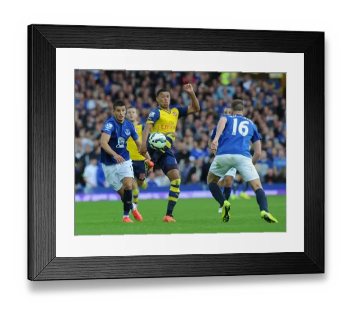Framed Print : Intense Battle: Oxlade-Chamberlain vs. Merallas & McCarthy - Everton vs. Arsenal, Premier League 2014 / 15