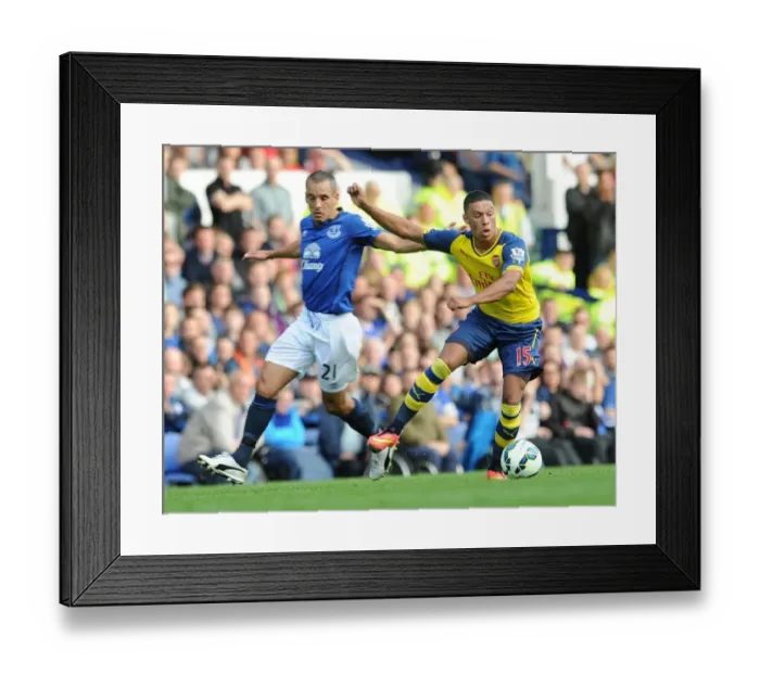 Framed Print : Oxlade-Chamberlain vs. Osman: The Intense Battle at Goodison Park, Premier League 2014 / 15 Framed Print : Oxlade-Chamberlain vs. Osman: The Intense Battle at Goodison Park, Premier League 2014 / 15