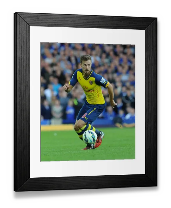 Framed Print : Aaron Ramsey in Action: Everton vs Arsenal, Premier League 2014 / 15 Framed Print : Aaron Ramsey in Action: Everton vs Arsenal, Premier League 2014 / 15