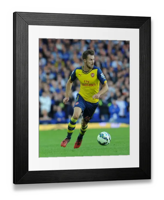 Framed Print : Aaron Ramsey in Action: Everton vs. Arsenal, Premier League 2014 / 15 Framed Print : Aaron Ramsey in Action: Everton vs. Arsenal, Premier League 2014 / 15