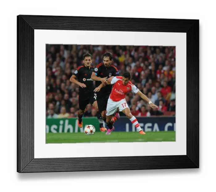 Framed Print : Arsenal's Alexis Sanchez Fouls Olcay Sahan in 2014 UEFA Champions League Qualifier Framed Print : Arsenal's Alexis Sanchez Fouls Olcay Sahan in 2014 UEFA Champions League Qualifier