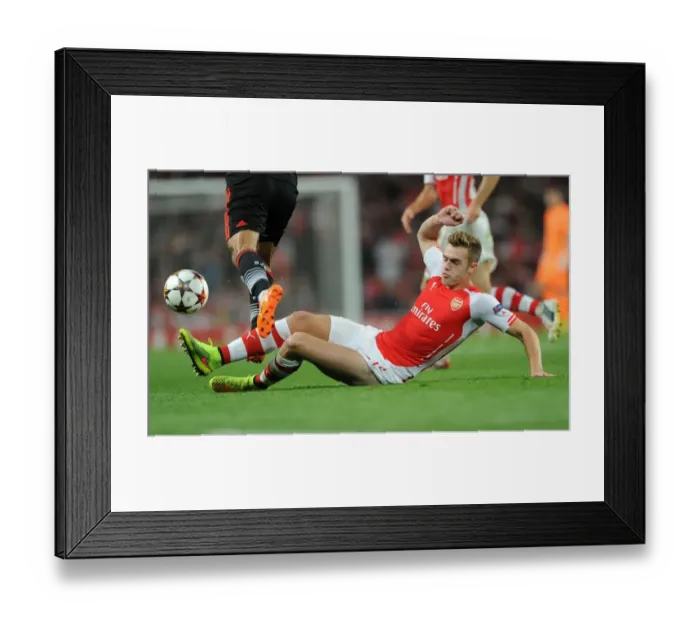 Framed Print : Calum Chambers in Action: Arsenal vs Besiktas, UEFA Champions League Qualifiers 2014