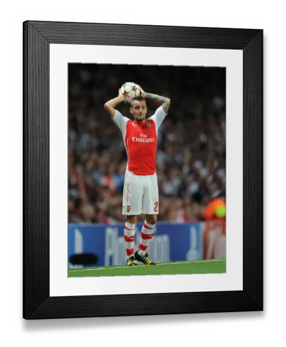 Framed Print : Mathieu Debuchy in Action: Arsenal FC vs Besiktas JK, UEFA Champions League Qualifiers (2014)