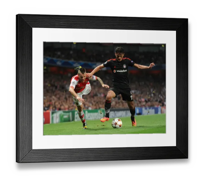 Framed Print : Debuchy vs. Pektemek: Intense Face-Off in Arsenal's Champions League Battle Framed Print : Debuchy vs. Pektemek: Intense Face-Off in Arsenal's Champions League Battle