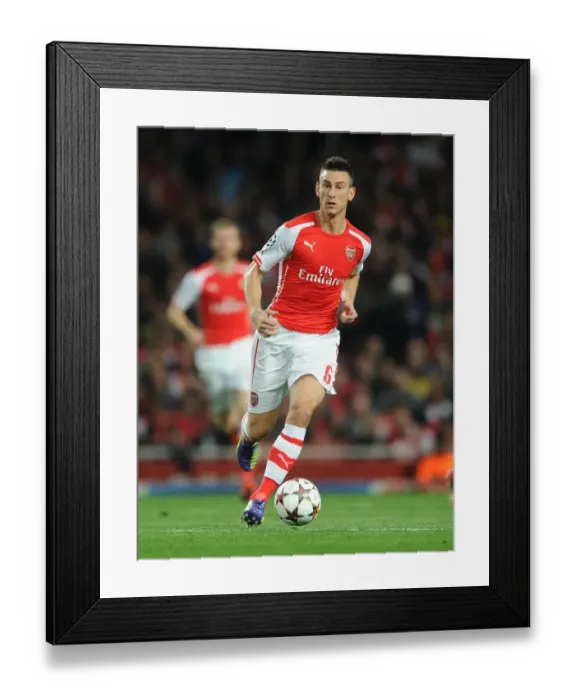 Framed Print : Laurent Koscielny Focused During Arsenal's UEFA Champions League Clash Against Besiktas (2014) Framed Print : Laurent Koscielny Focused During Arsenal's UEFA Champions League Clash Against Besiktas (2014)