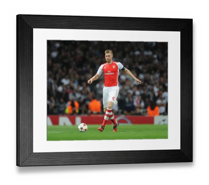 Framed Print : Per Mertesacker Focuses Ahead of Arsenal's Champions League Showdown Against Besiktas