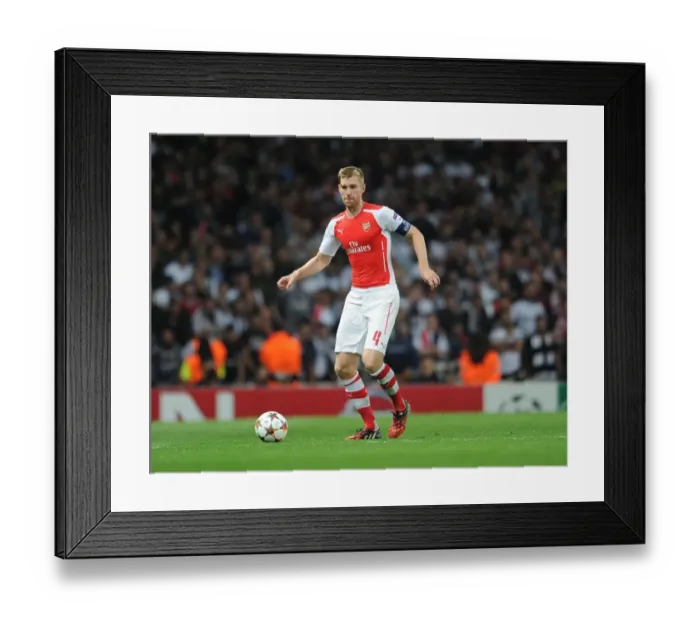 Framed Print : Per Mertesacker: Arsenal's Focused Defender Prepares for Champions League Showdown Against Besiktas Framed Print : Per Mertesacker: Arsenal's Focused Defender Prepares for Champions League Showdown Against Besiktas