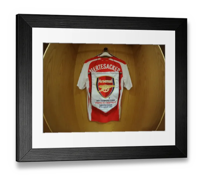 Framed Print : Per Mertesacker's Arsenal Shirt in the Changing Room Before Arsenal vs. Besiktas, UEFA Champions League Qualifying Play-Offs (2014)