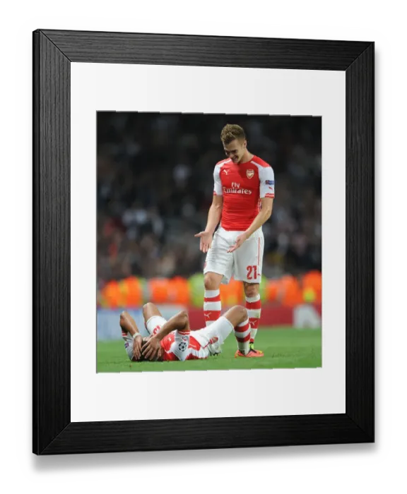 Framed Print : Arsenal's Oxlade-Chamberlain and Chambers: Jubilant Victory Moment after Securing UEFA Champions League Qualification vs Besiktas (2014) Framed Print : Arsenal's Oxlade-Chamberlain and Chambers: Jubilant Victory Moment after Securing UEFA Champions League Qualification vs Besiktas (2014)
