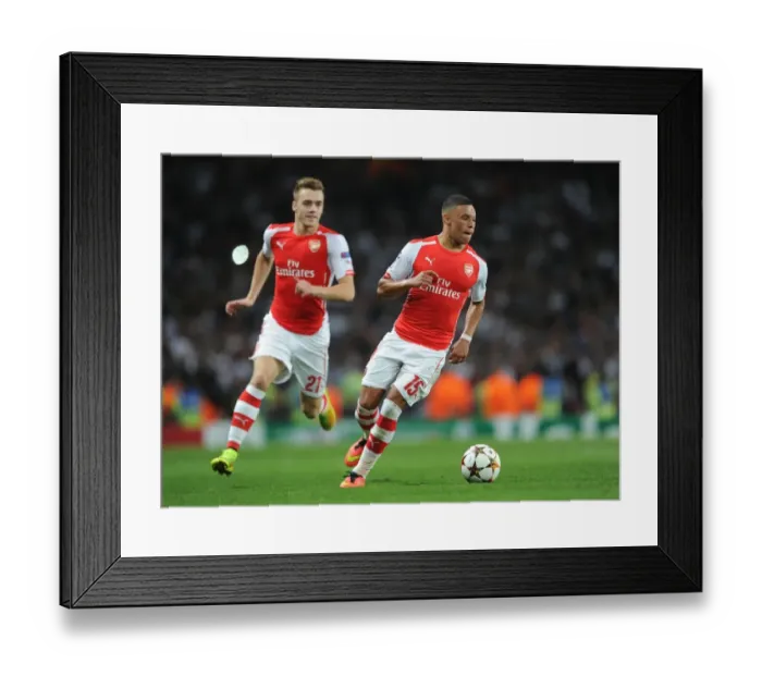 Framed Print : Arsenal FC: Oxlade-Chamberlain and Chambers in Action during the 2014 UEFA Champions League Qualifier Framed Print : Arsenal FC: Oxlade-Chamberlain and Chambers in Action during the 2014 UEFA Champions League Qualifier