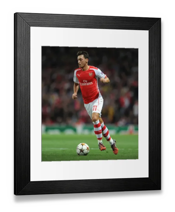 Framed Print : Mesut Ozil in Action: Arsenal vs. Besiktas, UEFA Champions League Qualifiers (2014)