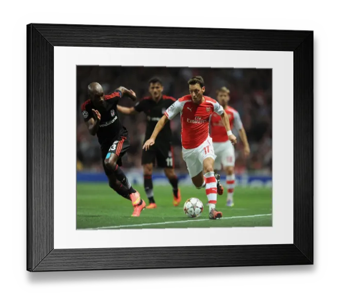 Framed Print : Mesut Ozil Outmaneuvers Atiba Hutchinson: Arsenal FC vs Besiktas JK, UEFA Champions League Qualifiers (2014) Framed Print : Mesut Ozil Outmaneuvers Atiba Hutchinson: Arsenal FC vs Besiktas JK, UEFA Champions League Qualifiers (2014)