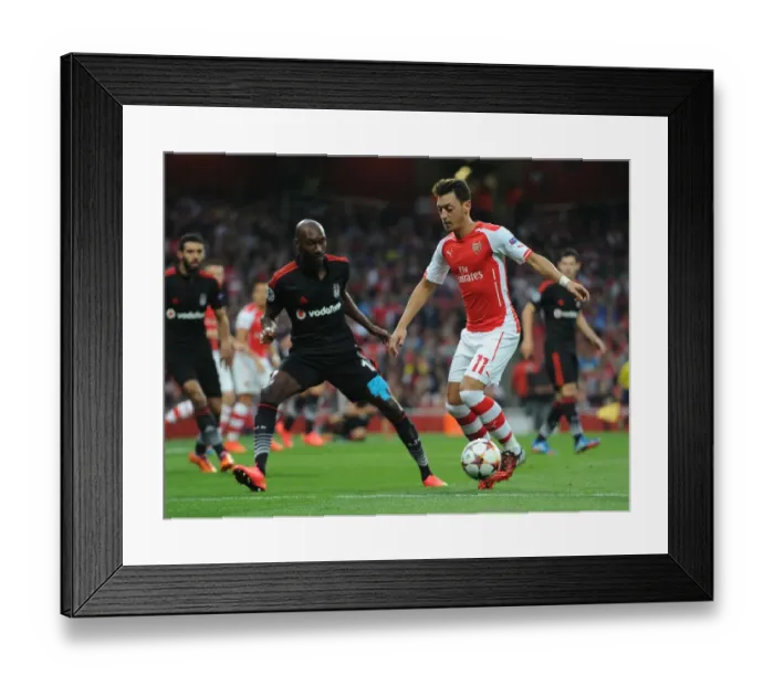 Framed Print : Mesut Ozil Outsmarts Atiba Hutchinson: Arsenal's UEFA Champions League Victory Framed Print : Mesut Ozil Outsmarts Atiba Hutchinson: Arsenal's UEFA Champions League Victory