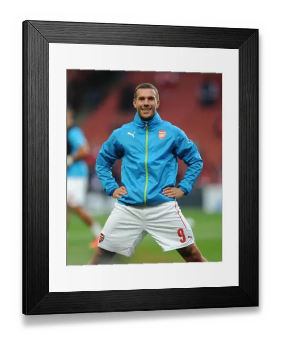 Framed Print : Lukas Podolski Prepares for Arsenal's UEFA Champions League Clash against Besiktas Framed Print : Lukas Podolski Prepares for Arsenal's UEFA Champions League Clash against Besiktas