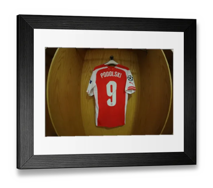 Framed Print : Lukas Podolski's Arsenal Shirt in the Changing Room Before Arsenal vs. Besiktas, UEFA Champions League Qualifiers (2014) Framed Print : Lukas Podolski's Arsenal Shirt in the Changing Room Before Arsenal vs. Besiktas, UEFA Champions League Qualifiers (2014)
