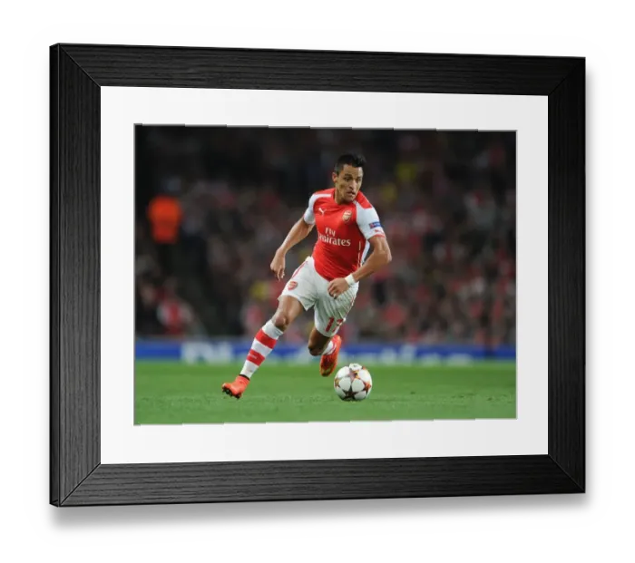 Framed Print : Arsenal's Alexis Sanchez in Action: Arsenal vs Besiktas, 2014 UEFA Champions League Qualifiers