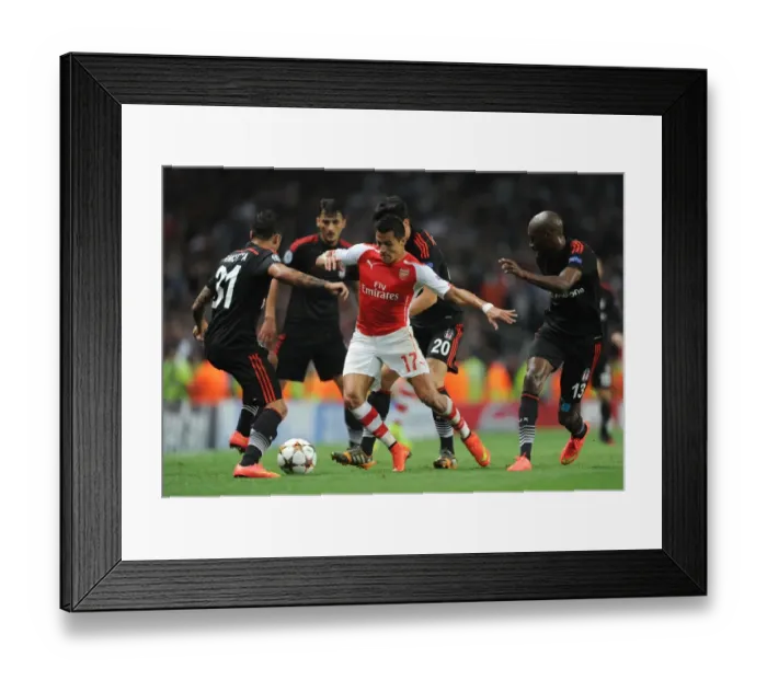 Framed Print : Arsenal's Alexis Sanchez vs. Besiktas Trio: A Champions League Showdown