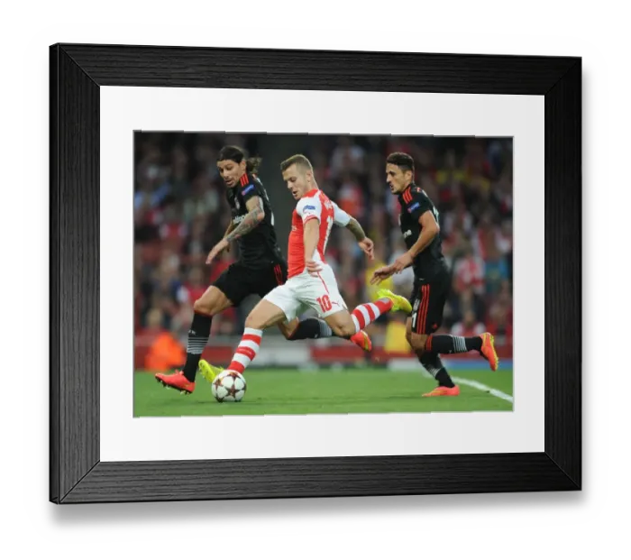 Framed Print : Arsenal's Jack Wilshere Faces Off Against Besiktas Duo in Champions League Clash