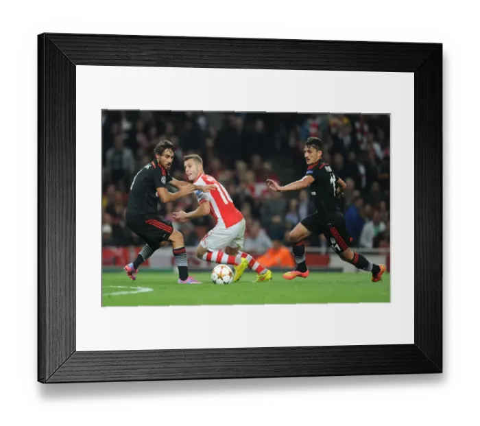 Framed Print : Jack Wilshere vs. Mustafa Pektemek and Ersan Gulum: Intense Face-Off in Arsenal's UEFA Champions League Clash Framed Print : Jack Wilshere vs. Mustafa Pektemek and Ersan Gulum: Intense Face-Off in Arsenal's UEFA Champions League Clash