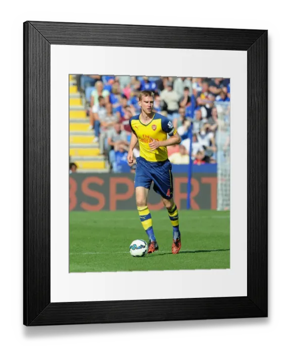 Framed Print : Per Mertesacker (Arsenal). Leicester City 1: 1 Arsenal. Barclays Premier League