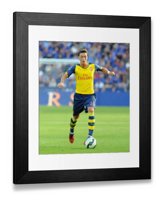 Framed Print : Mesut Ozil: In Action Against Leicester City, Premier League 2014-15 Framed Print : Mesut Ozil: In Action Against Leicester City, Premier League 2014-15