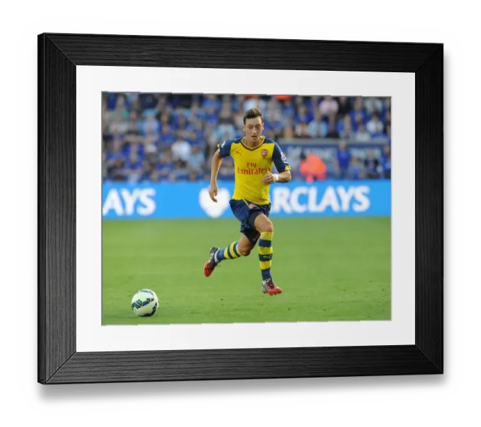 Framed Print : Mesut Ozil (Arsenal). Leicester City 1: 1 Arsenal. Barclays Premier League. The King Power Stadium Framed Print : Mesut Ozil (Arsenal). Leicester City 1: 1 Arsenal. Barclays Premier League. The King Power Stadium