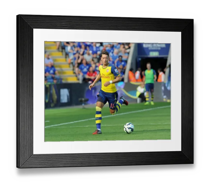 Framed Print : Arsenal and Leicester City Fight to 1-1 Draw: Mesut Ozil's Battle at The King Power Stadium Framed Print : Arsenal and Leicester City Fight to 1-1 Draw: Mesut Ozil's Battle at The King Power Stadium