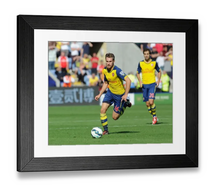 Framed Print : Aaron Ramsey (Arsenal). Leicester City 1: 1 Arsenal. Barclays Premier League. The King Power Stadium