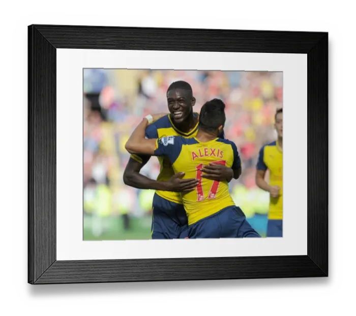 Framed Print : Arsenal's Star Duo: Sanchez and Sanogo in Glory: Celebrating a Goal Against Leicester City (2014-15) Framed Print : Arsenal's Star Duo: Sanchez and Sanogo in Glory: Celebrating a Goal Against Leicester City (2014-15)