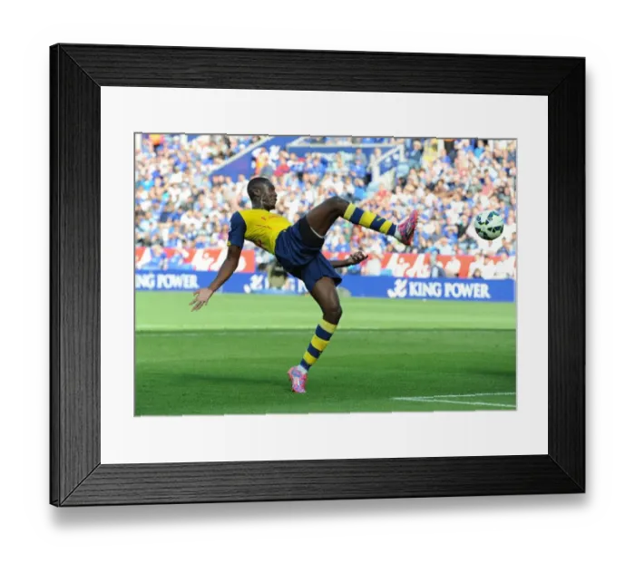 Framed Print : Yaya Sanogo (Arsenal). Leicester City 1: 1 Arsenal. Barclays Premier League. The King Power Stadium