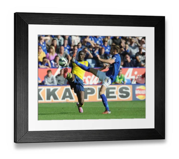 Framed Print : Clash at The King Power: Sanogo vs. King - Leicester City vs. Arsenal (2014-15) Framed Print : Clash at The King Power: Sanogo vs. King - Leicester City vs. Arsenal (2014-15)