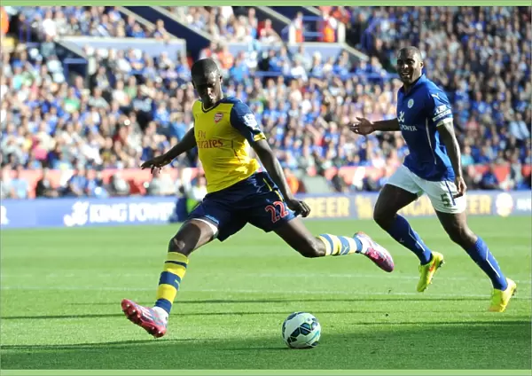 Yaya Sanogo (Arsenal) Wes Morgan (Leicester). Leicester City 1: 1 Arsenal. Barclays Premier League