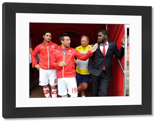 (L-R) Mikel Arteta, Santi Cazorla, Vic Akers (Kitman) and Joel Campbell (Arsenal) before the match