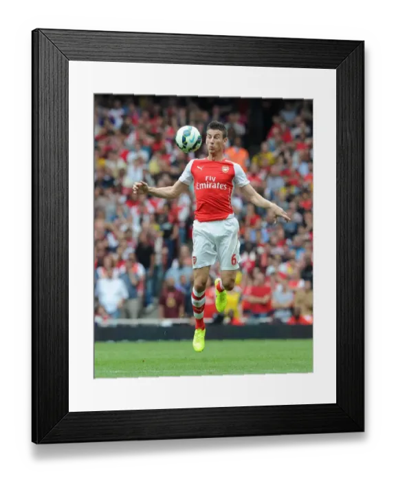 Framed Print : Arsenal's Koscielny in Action Against Manchester City (2014-15)