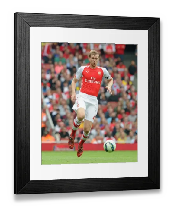 Framed Print : Per Mertesacker: Focused Defence Against Manchester City - Arsenal vs. Manchester City, Premier League 2014-15 Framed Print : Per Mertesacker: Focused Defence Against Manchester City - Arsenal vs. Manchester City, Premier League 2014-15