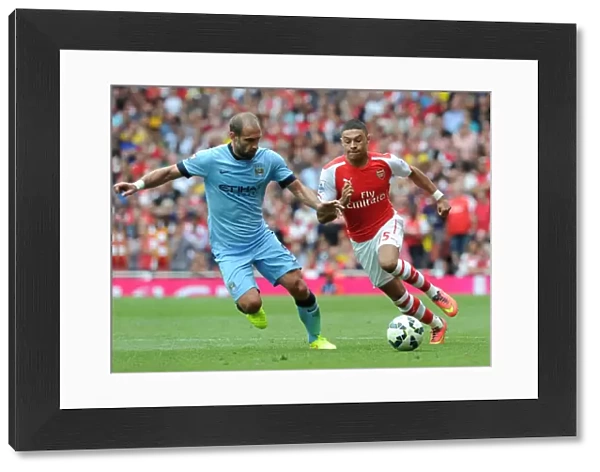 Alex Oxlade-Chamberlain (Arsenal) Pablo Zabaleta (Man City). Arsenal 2: 2 Manchester City